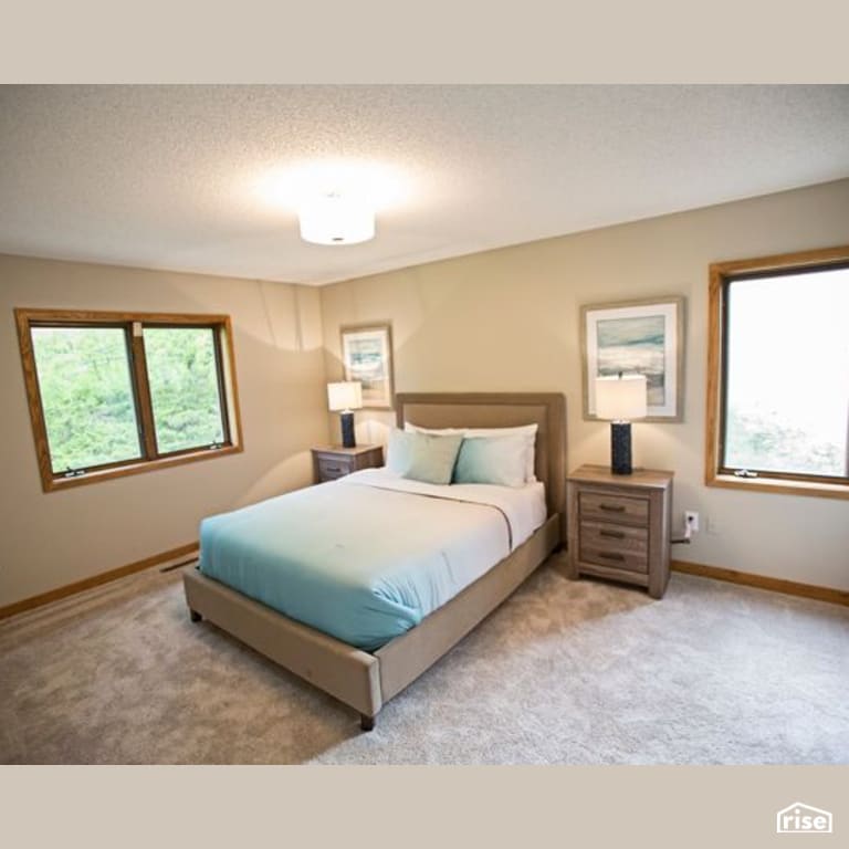 Bedroom with Ceiling Light by Constructive Builders