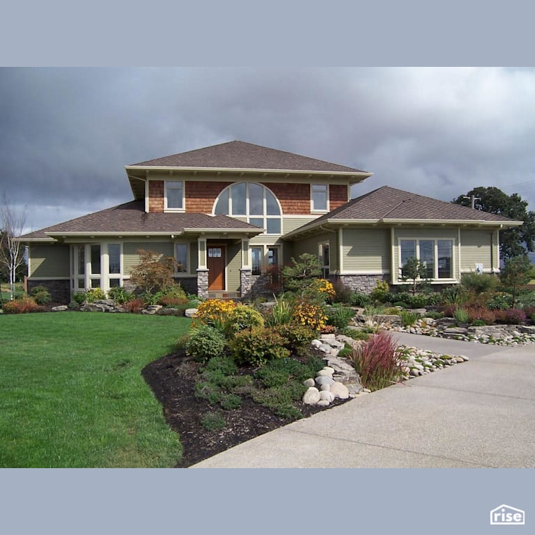 Home Exterior with Wood Shingles by Winsome Construction
