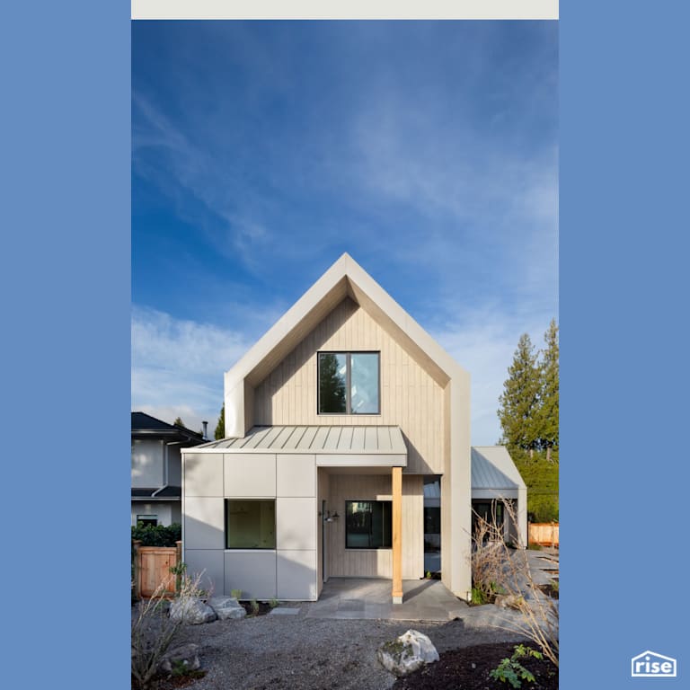Front Angle of Efficient Home with Grey Exterior with Mineral Wool Batt Insulation by Synthesis Design