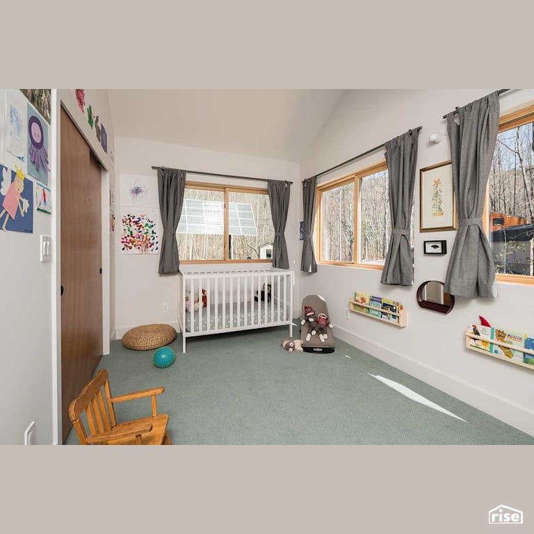Nursery with Carpeting by Deltec Homes