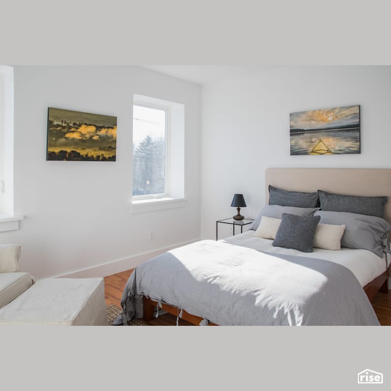 Light filled bedroom in Passive House certified townhouse bedroom with FSC Certified Hardwood by Alpen High Performance Products