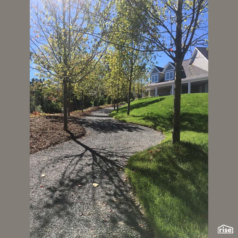Backyard Walkway with Wood Mulch by Earthworks Landscape & Design