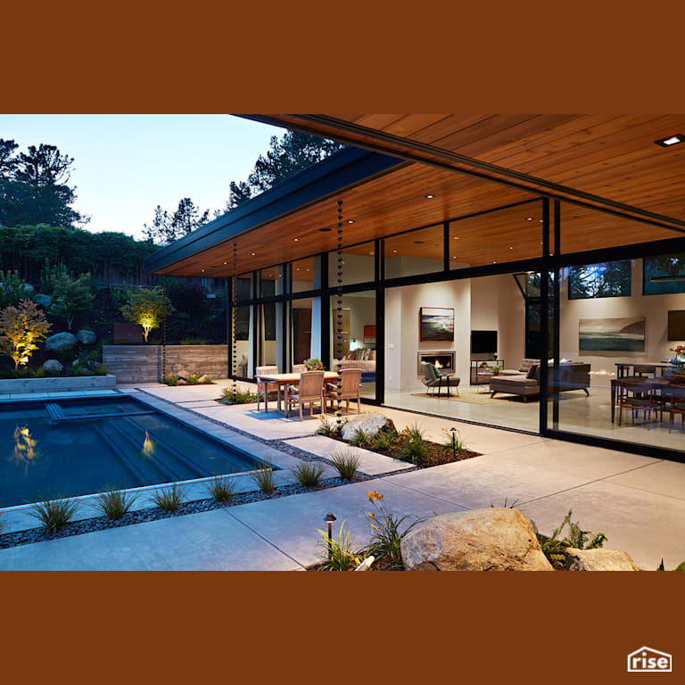 Glass Wall House with Concrete Flooring by Klopf Architecture