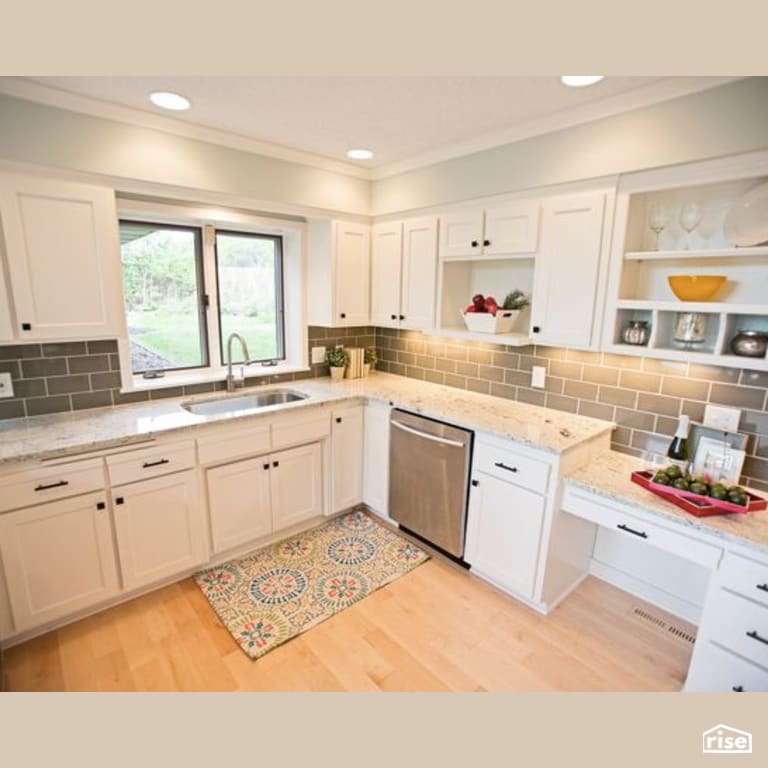 Kitchen with Low-Flow Kitchen Faucet by Constructive Builders