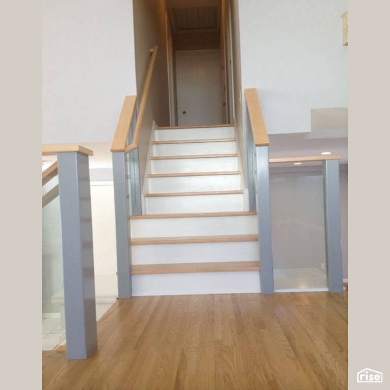 Custom staircase with FSC Certified Hardwood by Constructive Builders