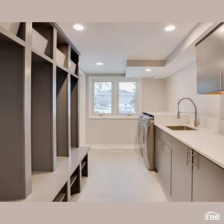 Laundry Room with Integrated LED by Constructive Builders