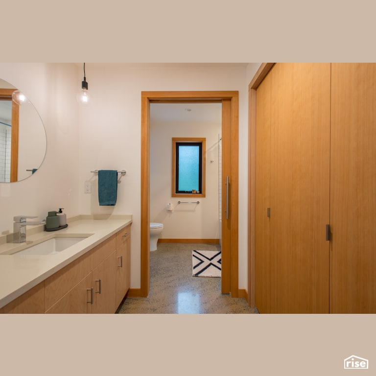 ModCab Series Bathroom with Concrete Flooring by FabCab Inc