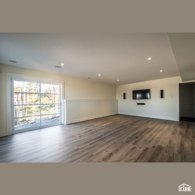 The Tempranillo - Family Room with Laminate Flooring by Bowers Construction