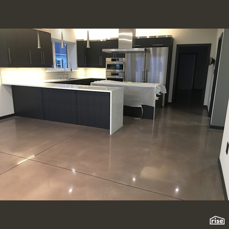 800 Grit cream polish with grey dye with Concrete Flooring by DeltaCrete