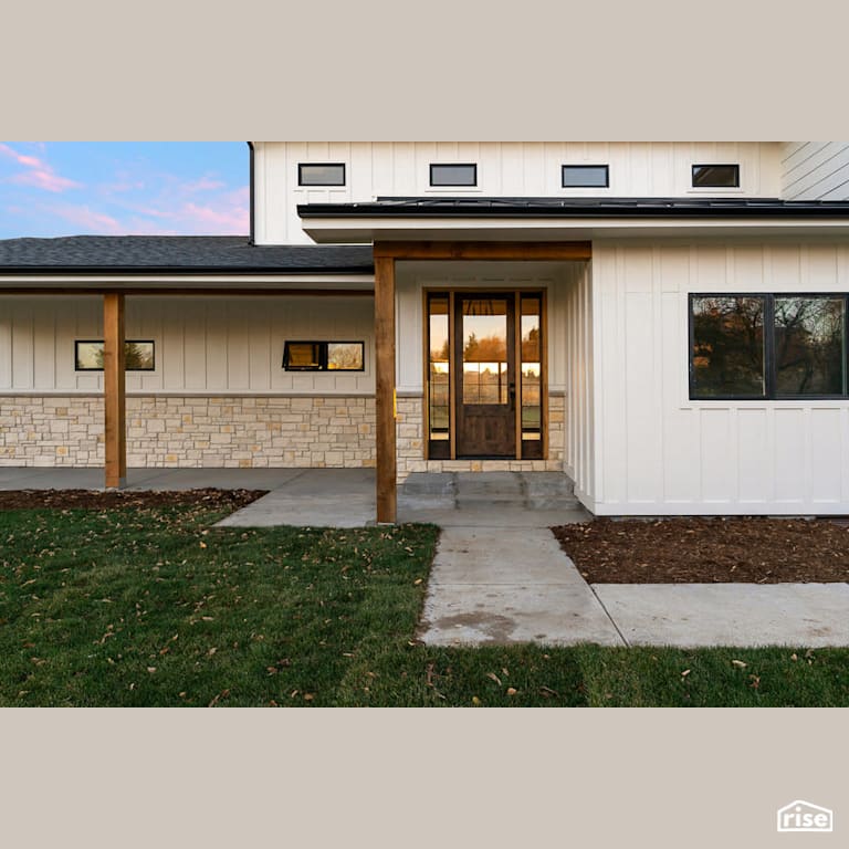 Modern farmhouse entryway with Fixed Window by Revolve Design Build
