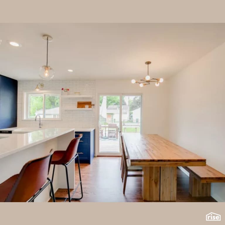 Dining Room with Low-Flow Kitchen Faucet by Constructive Builders