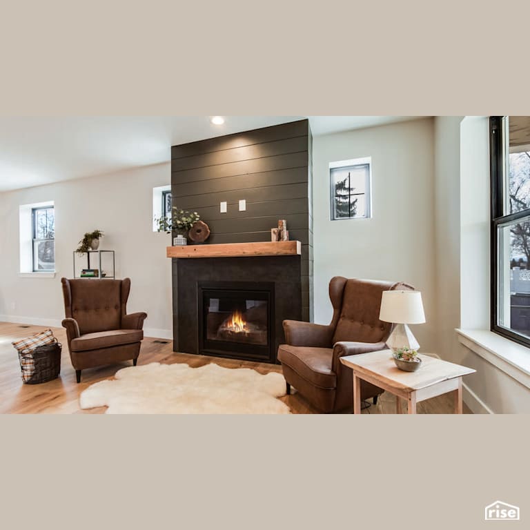 Gas fireplace with custom mantle with Gas Fireplace by Revolve Design Build