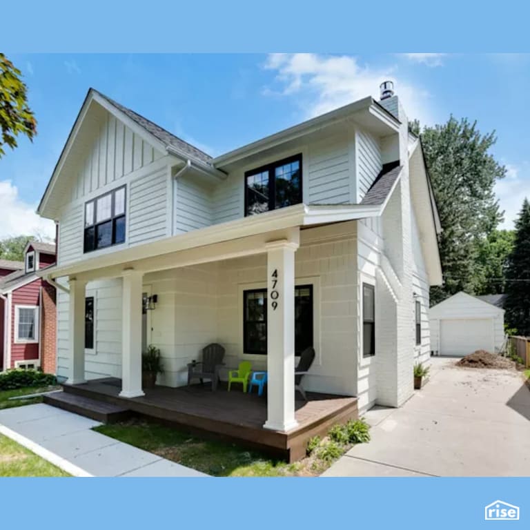 Exterior with Wood Shingles by Constructive Builders