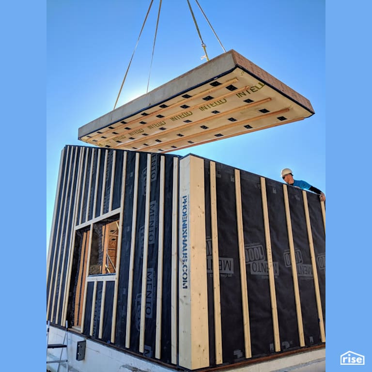 Panelized prefab Passive House exterior install with Prefabricated Panelized Home by Phoenix Haus LLC