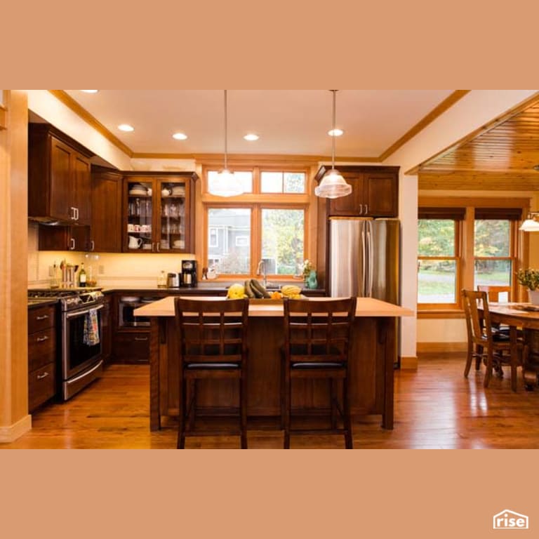 Kitchen with Gas Range by Winsome Construction