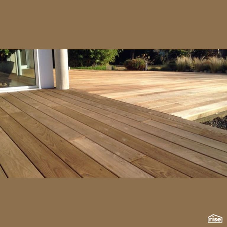 Rear exterior thermally modified wood deck with Thermally Modified Wood Decking by Thermalwood Canada