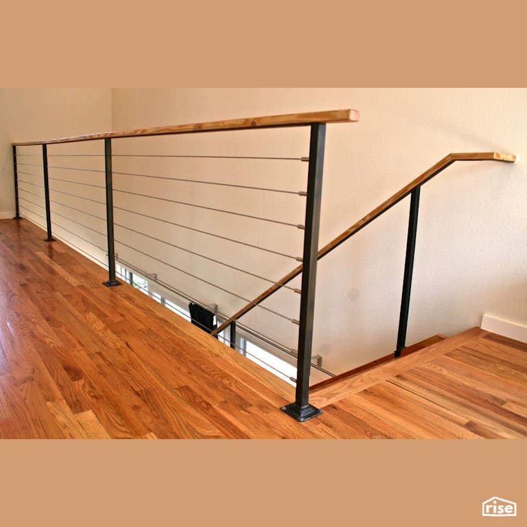 Open wire staircase with Engineered Hardwood by Revolve Design Build