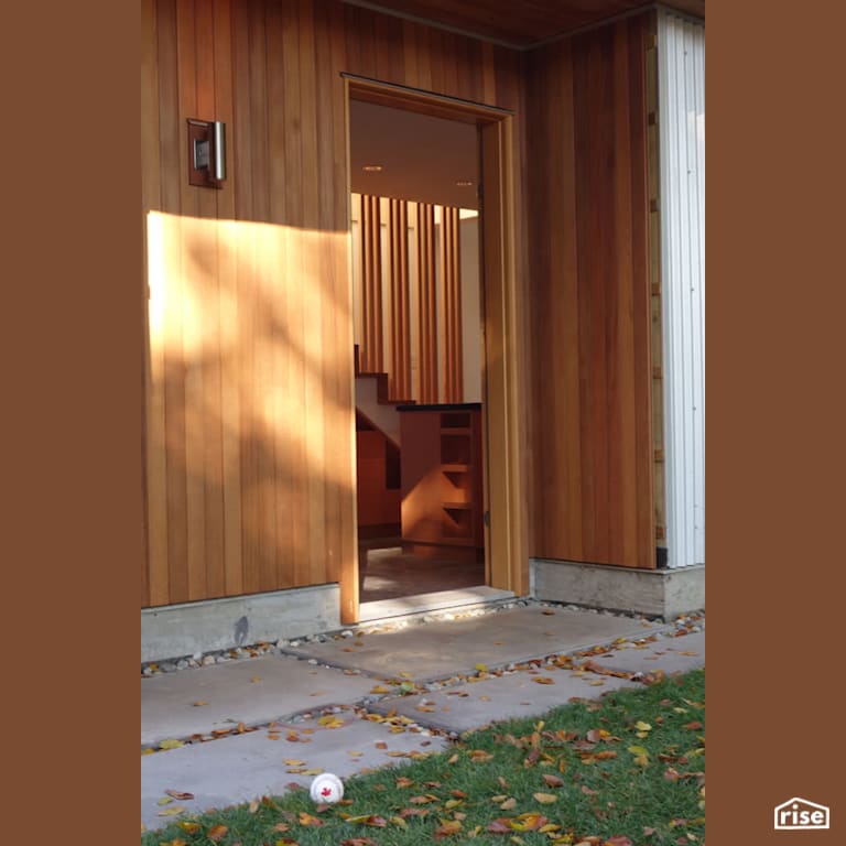 Entry with Solid Wood Door by MIZA Architects