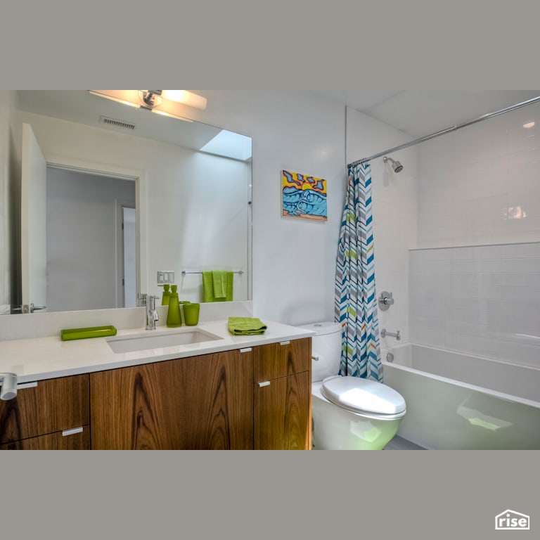 Bathroom with Dual Flush Toilet by Alliance Green Builders