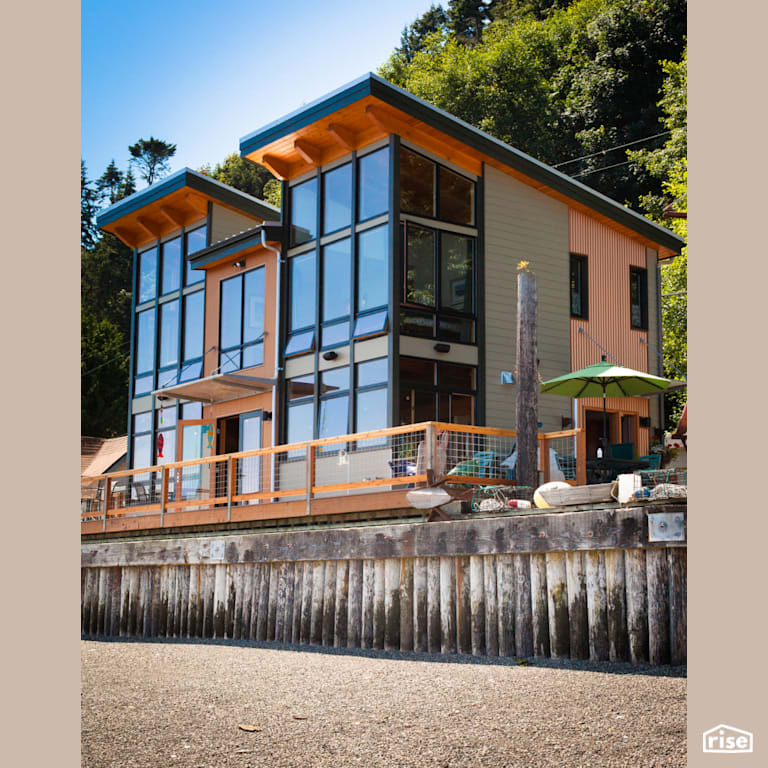 2 story Camano Island Home with Standing Seam Metal Roof by FabCab Inc