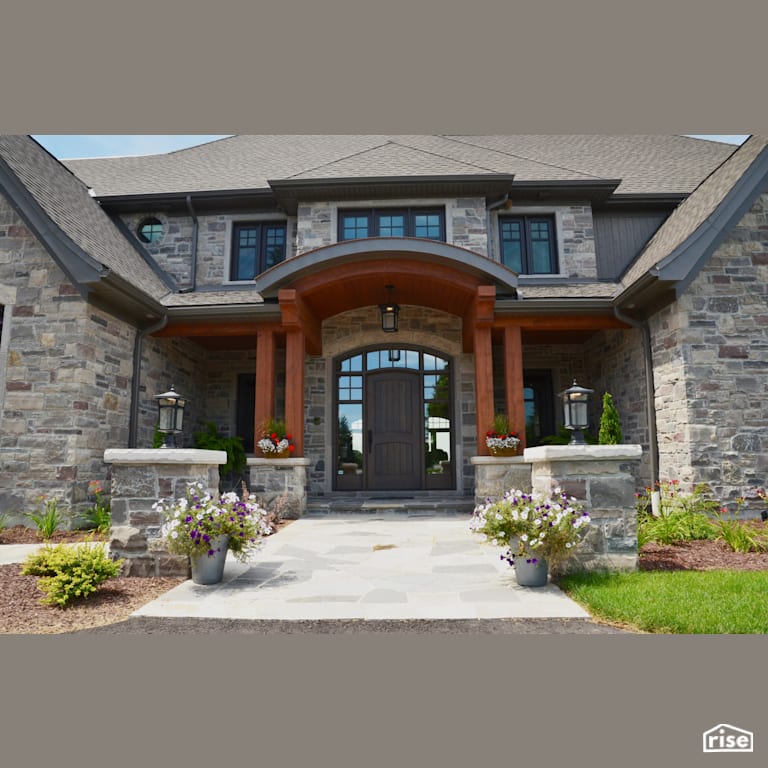 House with stone siding and shiplap entryway with Stone Siding by Masonal Stone Inc