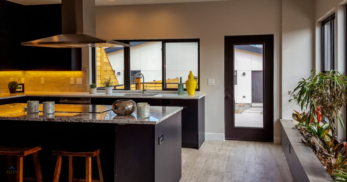 Open concept kitchen leading to patio with Energy Star Exterior Door by