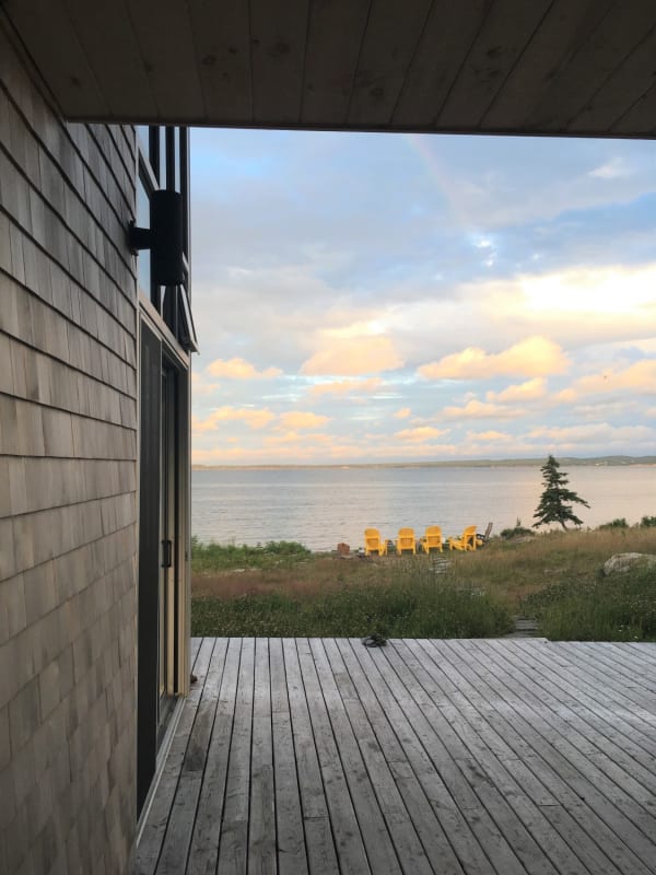 container home by the sea sunset