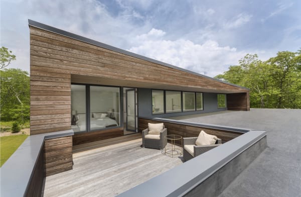 House with thermally modified wood and siding