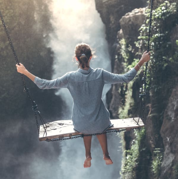 Swing over waterfall