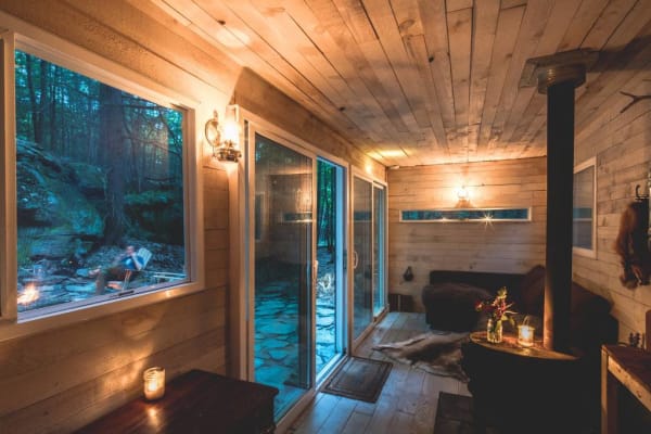 catskills container cabin living room night
