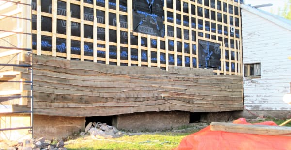 live edge wood siding on passive house retrofit