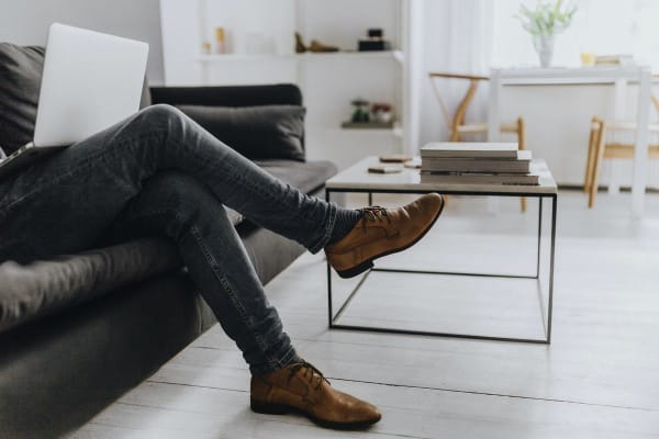 Sitting on Couch in clean house