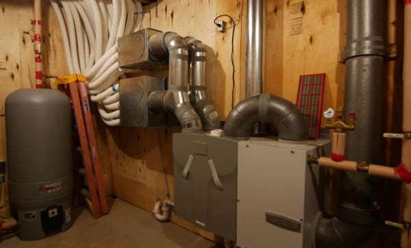 A utility room in a passive house containing an ERV