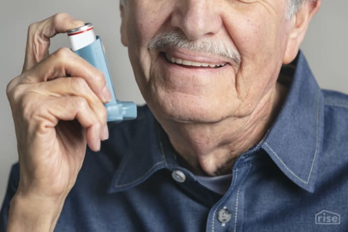 Man With Inhaler for Asthma