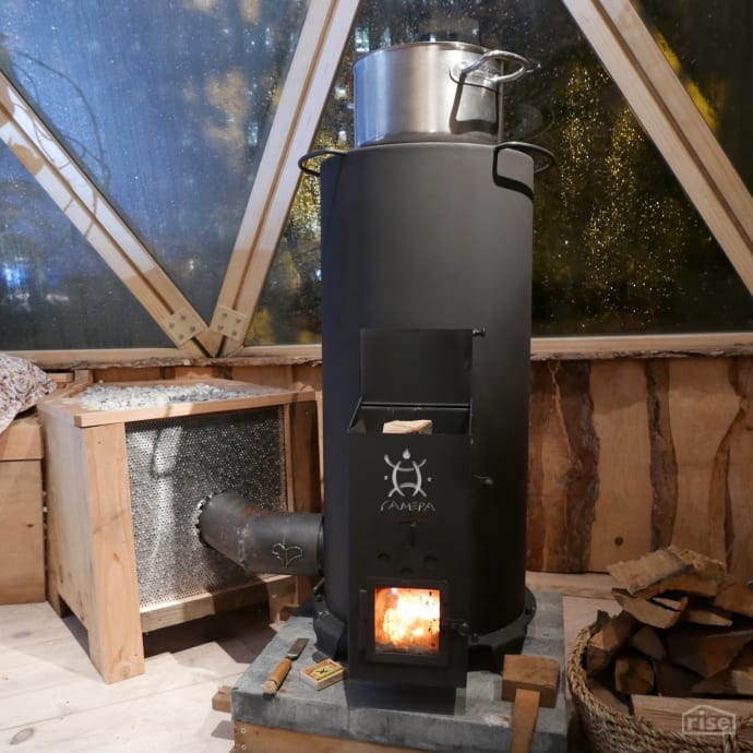 Rocket stove store for home heating