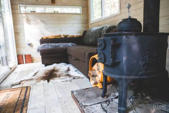 catskills container cabin fireplace