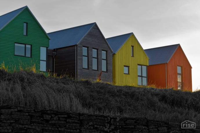 coloured houses with metal roofs