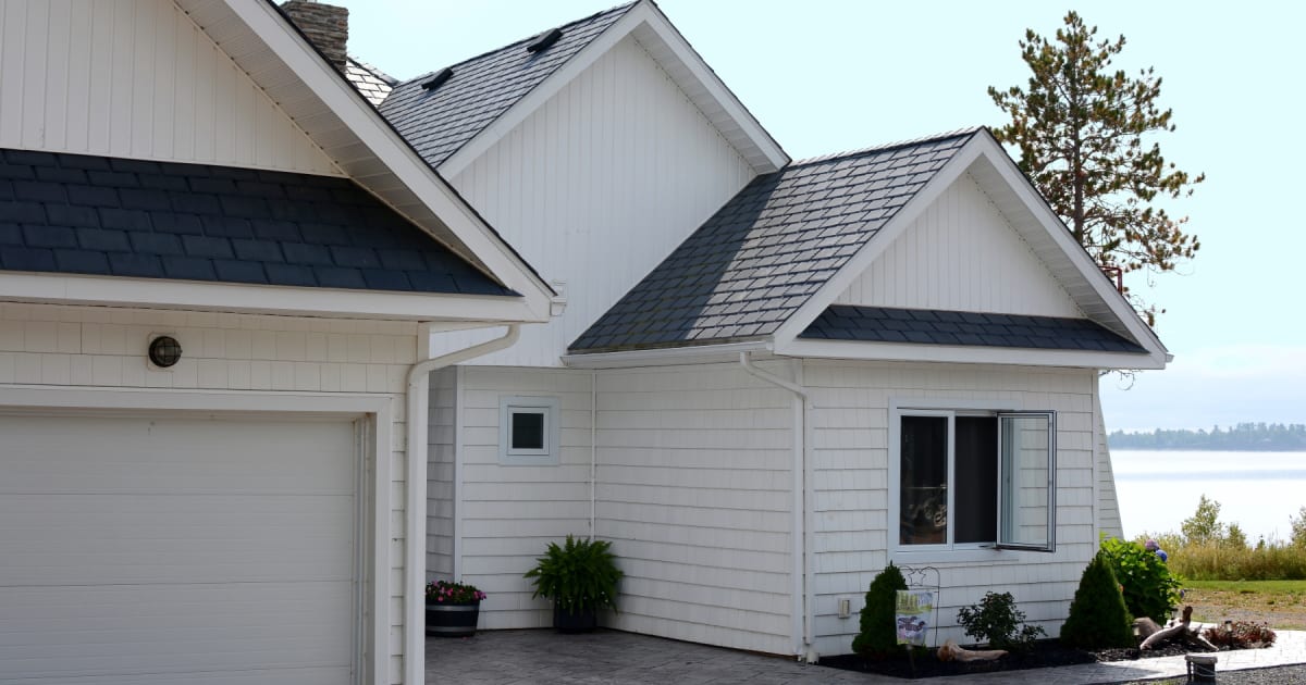 Rise Lakeside Home in Grand Lake, NB, Canada with Recycled Rubber