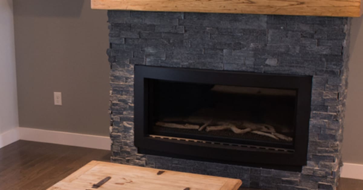Rise The Atlanta Living Room with Gas Fireplace by Justin Bowers Homes
