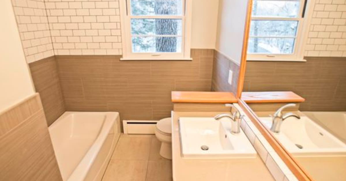 Image showcasing Rise | Bathroom with Low-Flow Bathroom Faucet by Constructive Builders