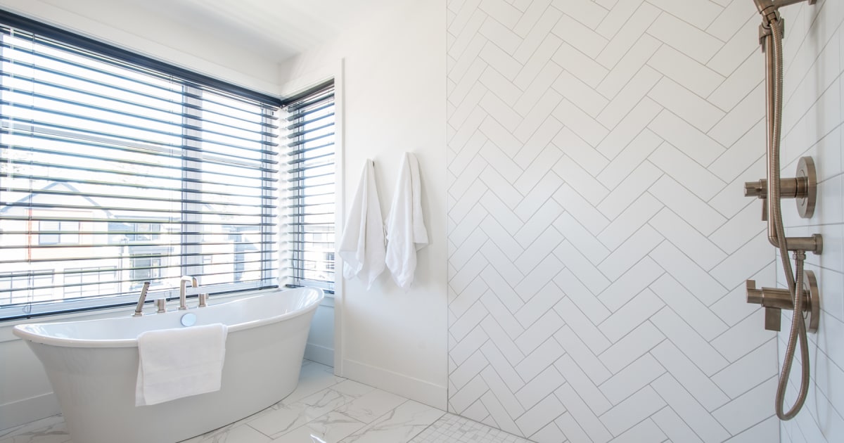 Weybridge Lane Bathroom with LowFlow Showerhead by Homes by Highgate