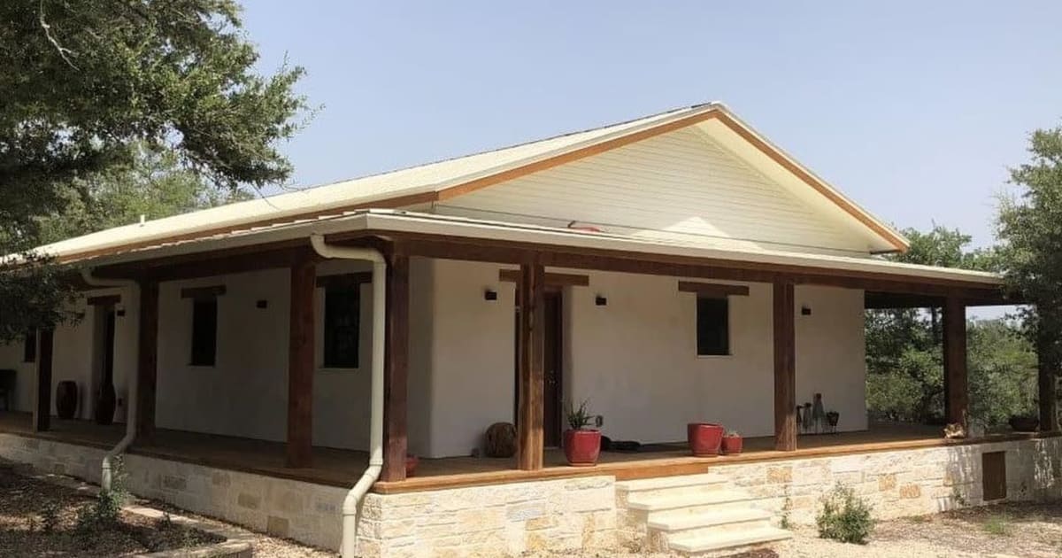 Rise Exterior of Texas compressed earth block home with Accent Outdoor Lighting by TexaTerra Block