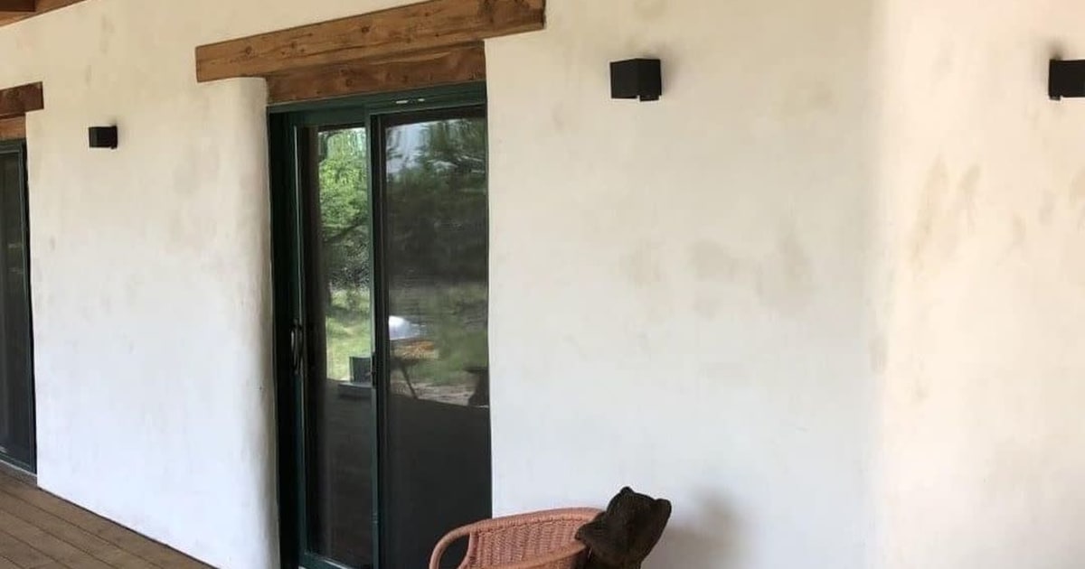 Rise Texas compressed earth block home entryway with Accent Outdoor